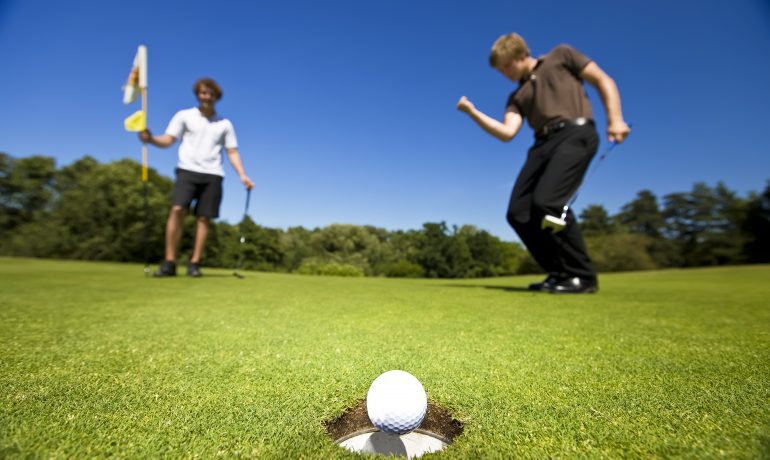 Stock Photo - Golfers winning